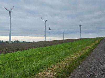 A few wind turbines near a rural lane in Germany